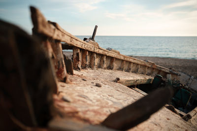 Old wooden boat abandoned. shallow depth of field.