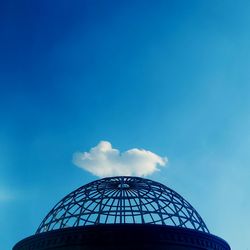 Low angle view of building against blue sky