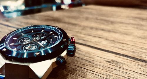 High angle view of clock on table