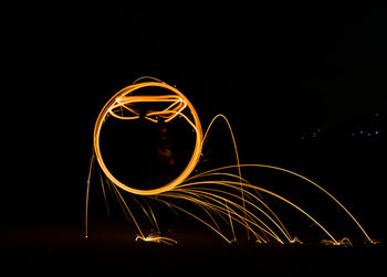 Light painting against black background