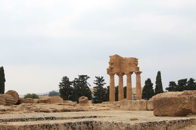 Old ruins of temple against sky