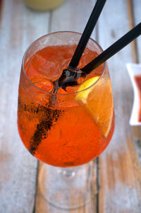 Close-up of orange drink on table