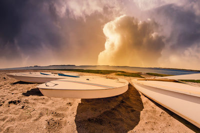 Panoramic view of beach against sky during sunset