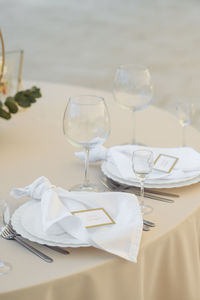 Close-up of wineglasses on table