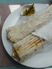 High angle view of wrap sandwiches on plate