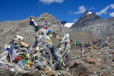 Tibetan prayer flags against mountain range