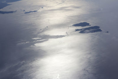 High angle view of sea shore against sky