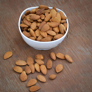 High angle view of various fruits in bowl on table