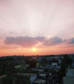 High angle view of townscape against sky during sunset