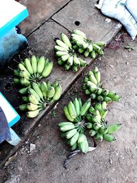 High angle view of fruits on footpath