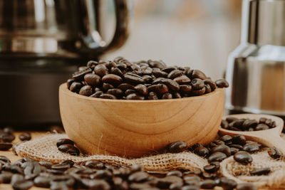 Close-up of coffee beans on table