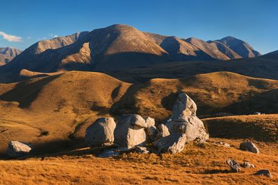 Scenic view of rocky mountains against sky