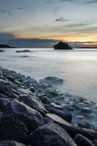 Scenic view of sea against sky during sunset