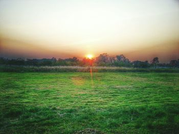 Scenic view of landscape at sunset