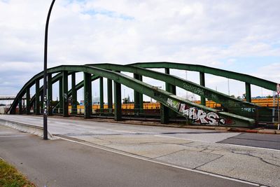 View of bridge against cloudy sky