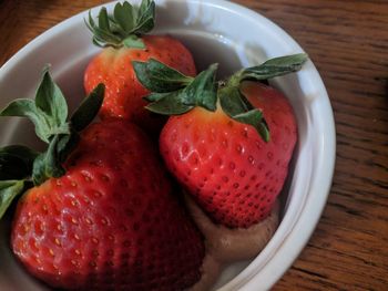 High angle view of strawberries on table