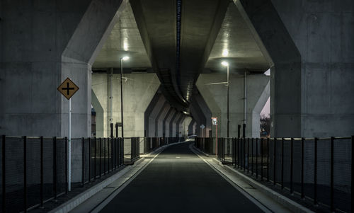 View of empty road under bridge