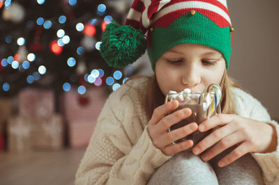 Portrait of woman with christmas decoration