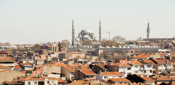 Cityscape against clear sky