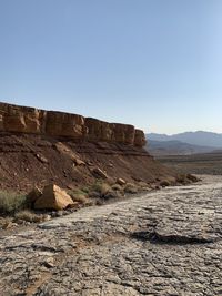 Scenic view of rocky mountains against clear sky