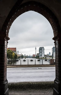 View of bridge over river in city