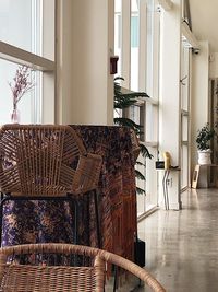 Empty chairs and tables in building