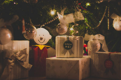 Christmas decorations hanging on tree