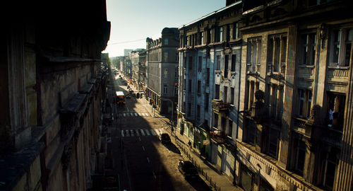 Road amidst buildings in city