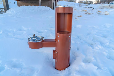 High angle view of ice cream on snow covered field