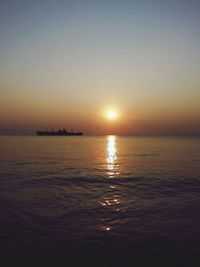 Scenic view of sea at sunset