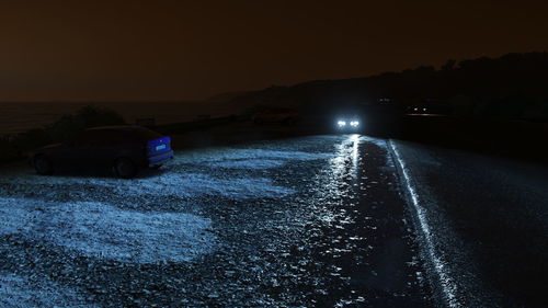 Scenic view of sea against sky at night