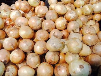 Full frame shot of onions for sale at market stall