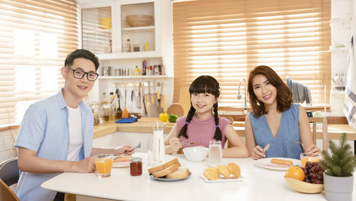 Group of people sitting in restaurant