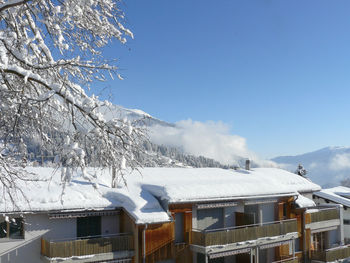 Snow covered mountain against sky