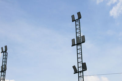 Low angle view of floodlight against sky