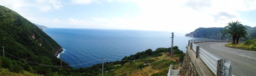 High angle view of road by sea against sky