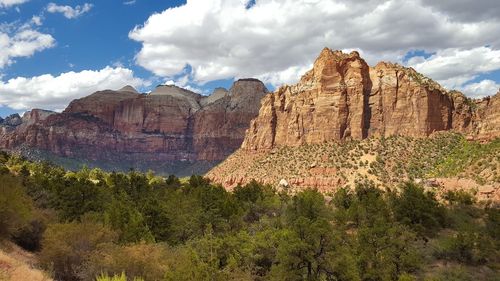 Panoramic view of rocky mountains against sky