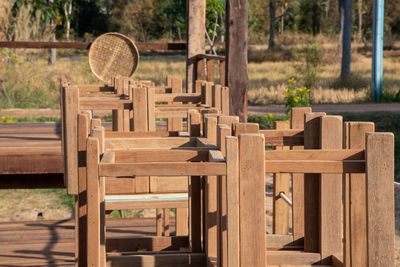 Empty chairs and table in park