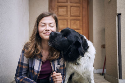 Portrait of woman with dog