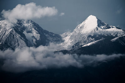 Scenic view of snow covered mountains