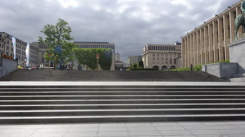 View of buildings against cloudy sky