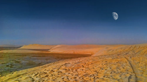 Scenic view of desert against sky