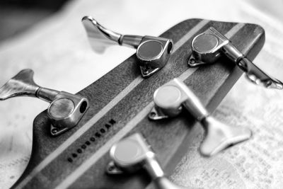 Cropped image of guitar on table