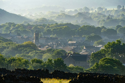 High angle view of trees and mountains against sky