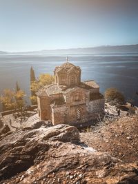 Panoramic view of sea and building against sky