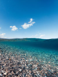 Calm ocean with cloudy sky