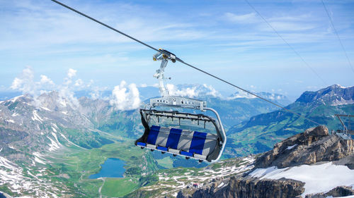 Overhead cable car against mountains