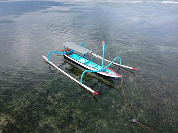 High angle view of boat moored in sea