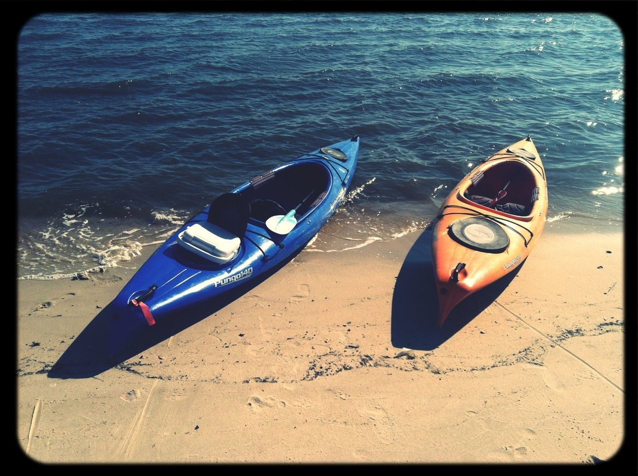 water, beach, transfer print, transportation, sea, boat, nautical vessel, sand, shore, moored, mode of transport, auto post production filter, tranquility, day, high angle view, outdoors, absence, nature, tranquil scene, sunlight