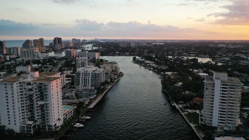 High angle view of buildings against sky during sunset